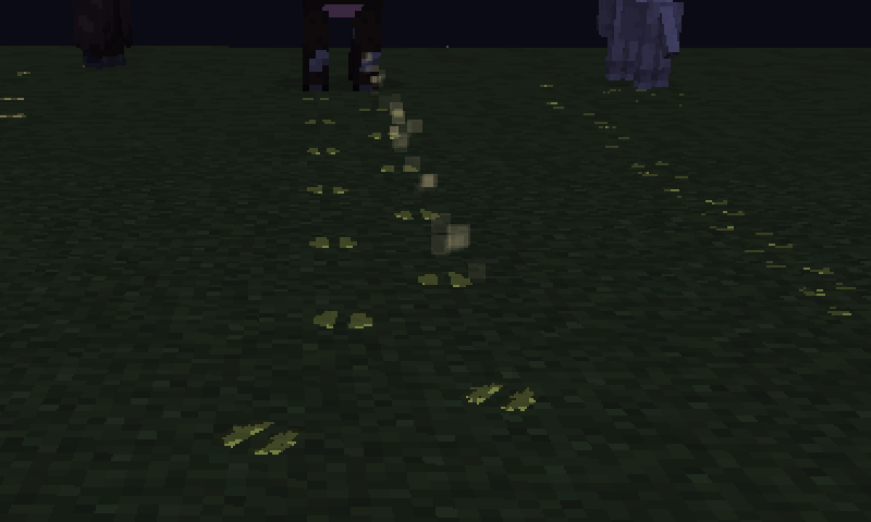 A cow's trail at night through the Tracker Goggles, with faint scent specks drifting from print to print.